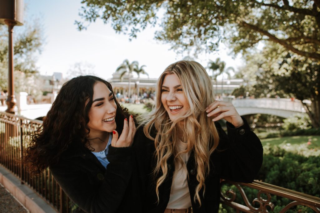 two girls laughing